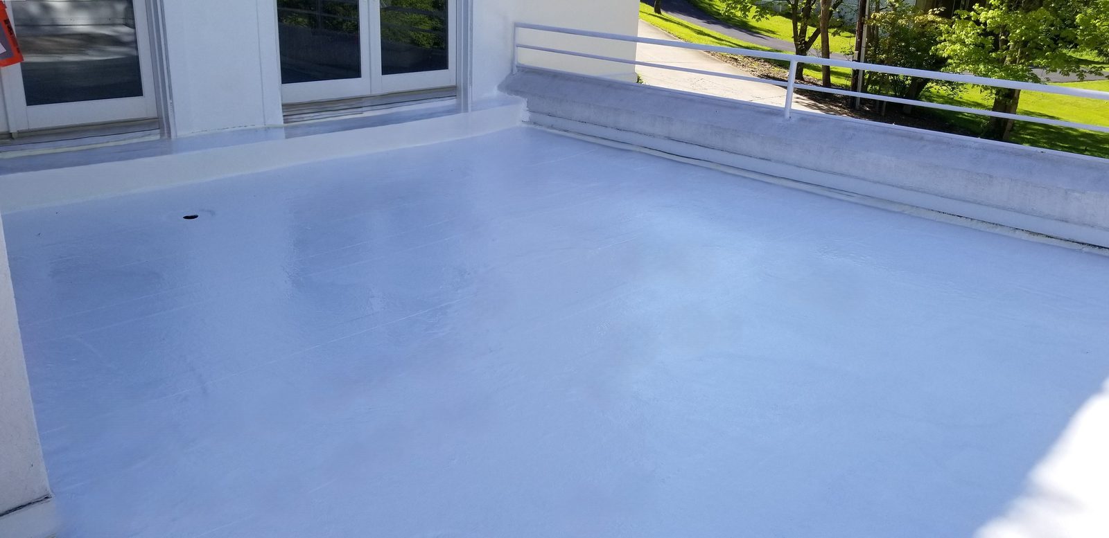 Freshly coated residential balcony surface