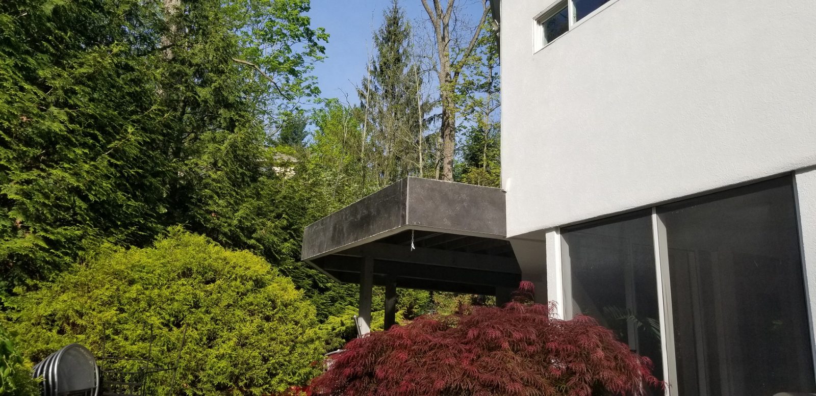 Cantilevered rooftop deck on a modern high-end residential property